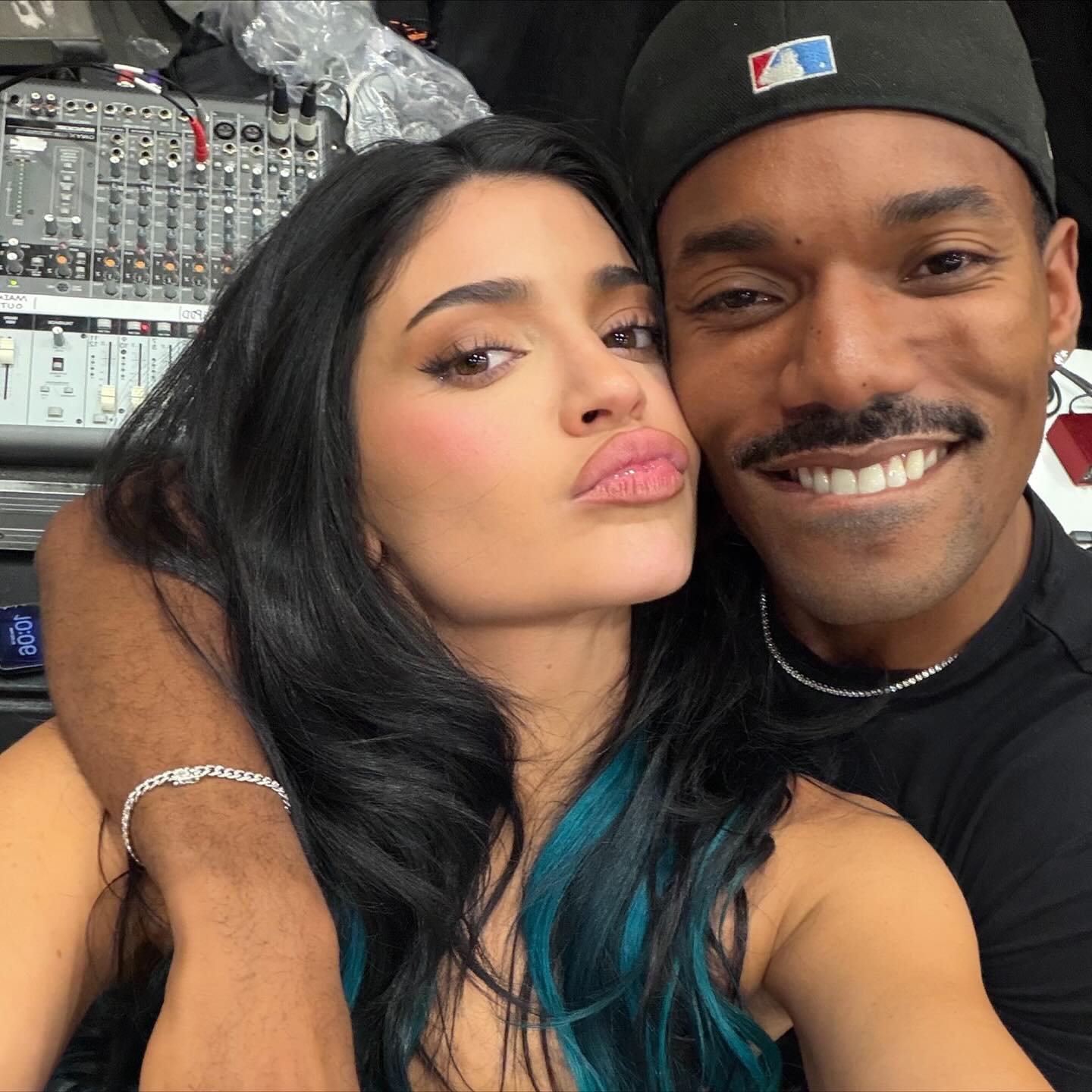 Kylie Jenner puckers up for a snap with pal Carter Gregory.