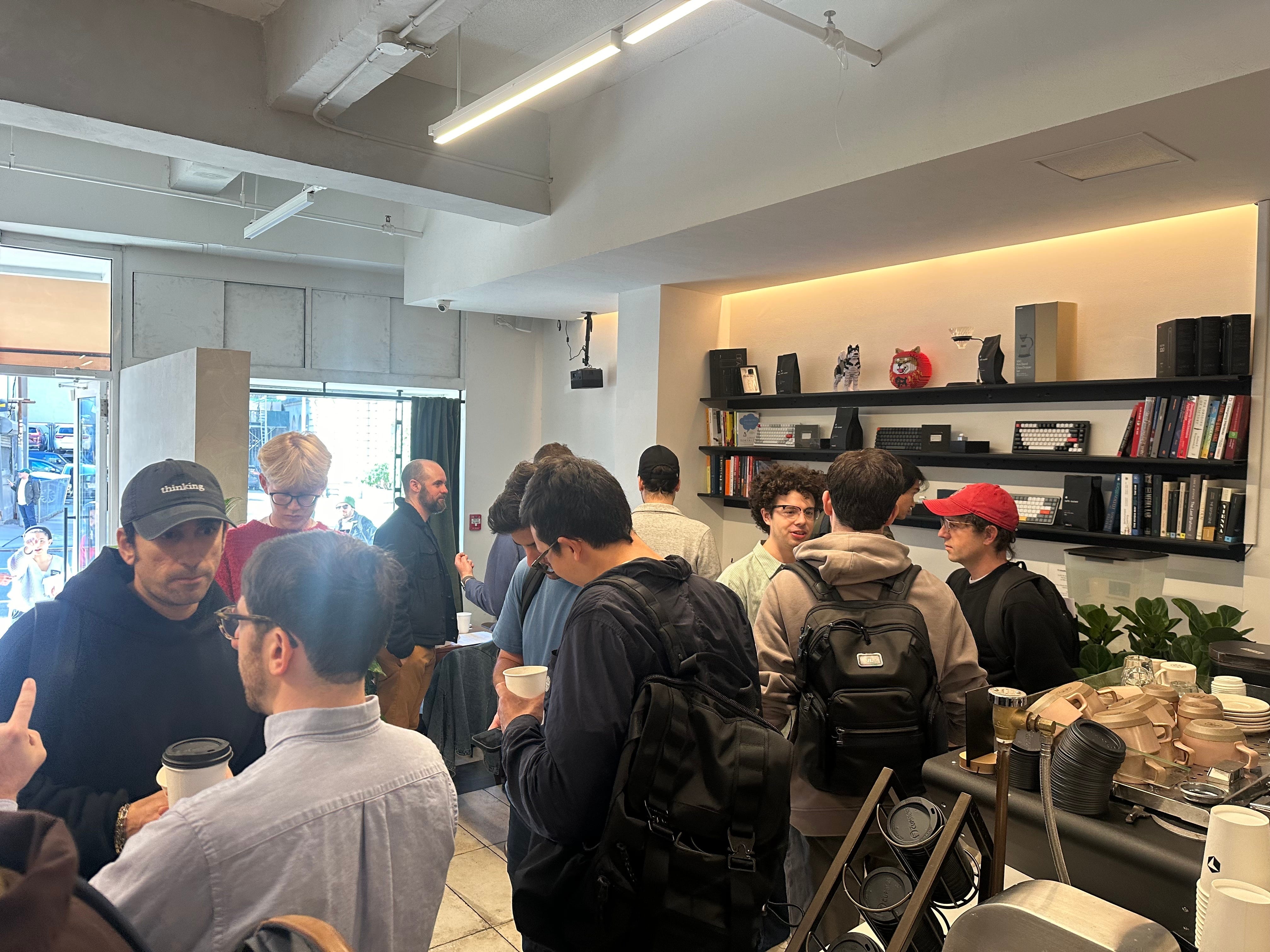 Men are pictured at Cafe Cursor.