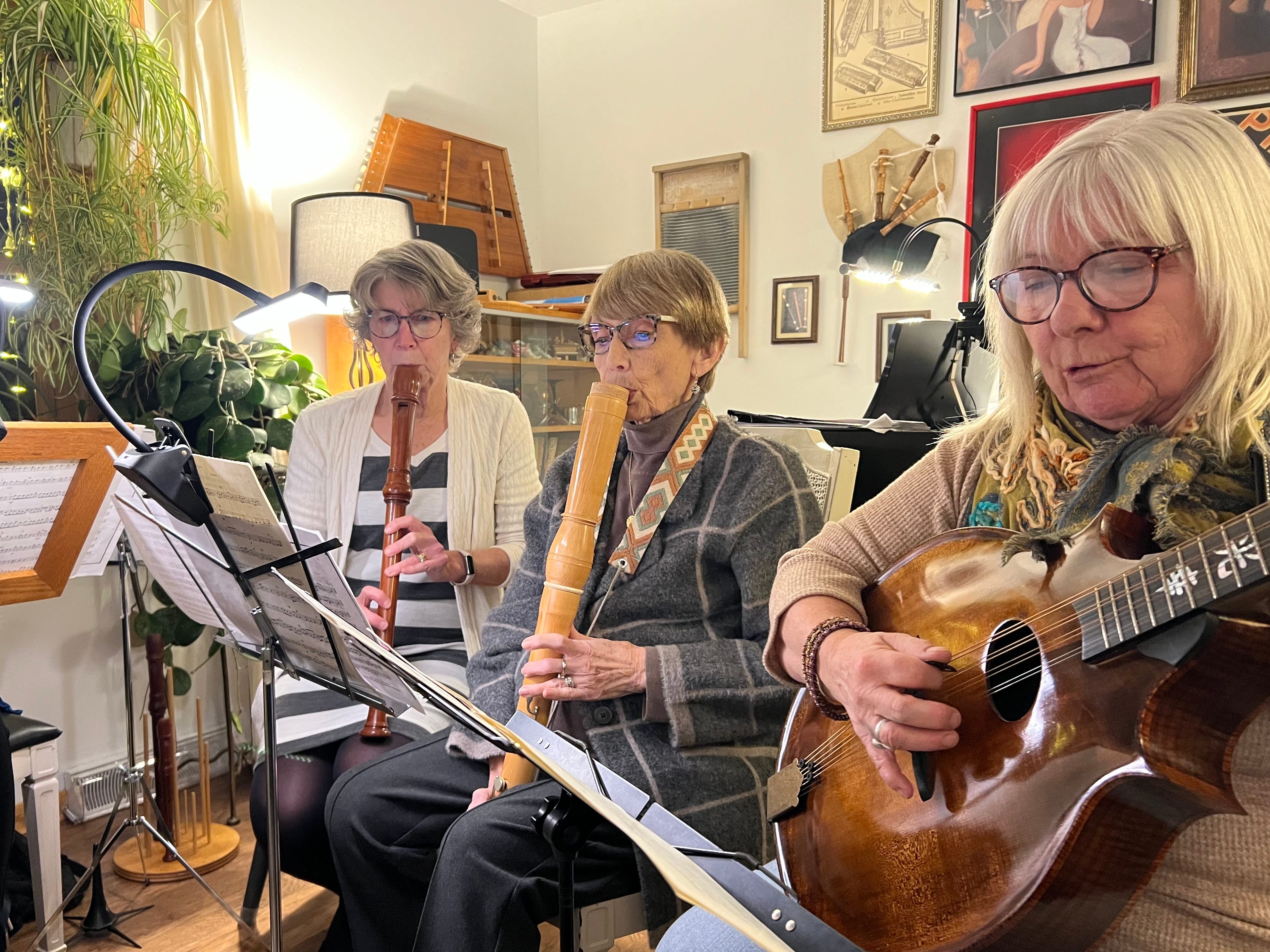 The author, far left, playing an instrument alongside members of her early music group.