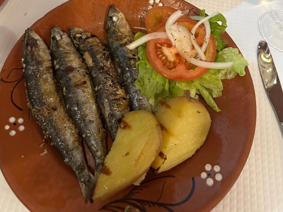 Two plates with fish, potatoes