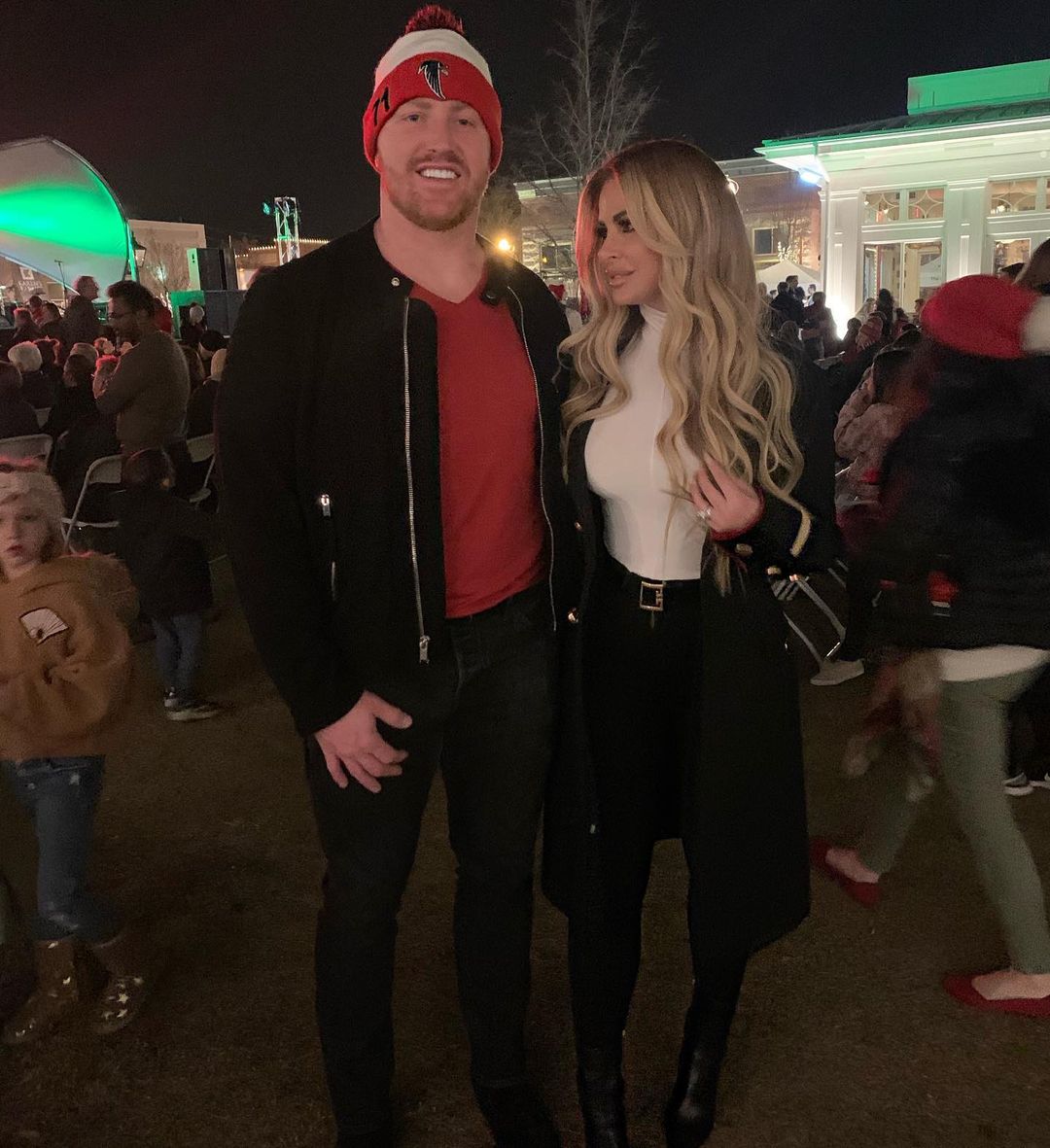 Kim Zolciak and Kroy Biermann posing for a photo.