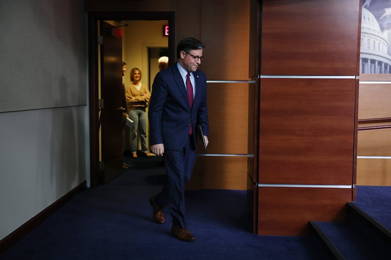 House Speaker Mike Johnson walks into his daily news conference on Day 22 of the government shutdown on October 22, 2025.