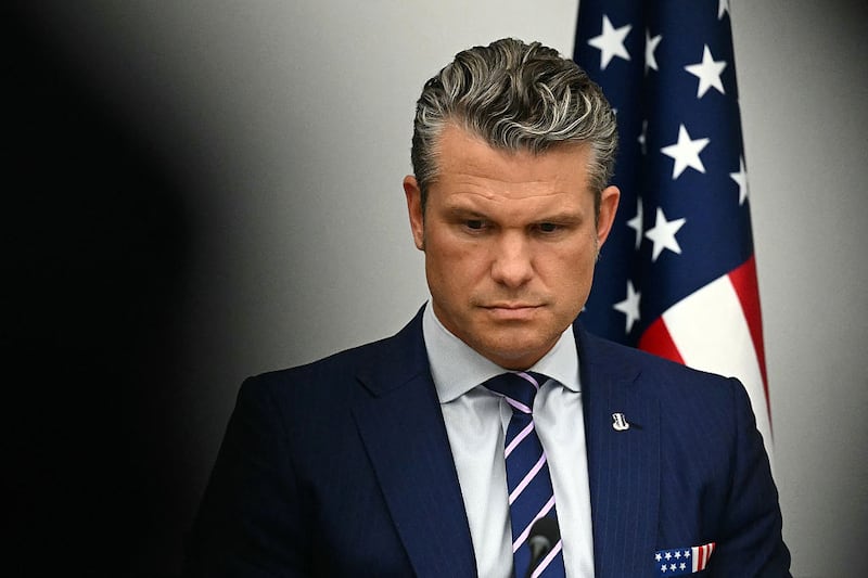 US Secretary of Defense Pete Hegseth looks on as unseen US President Donald Trump meets with unseen Ukrainian President Volodymyr Zelensky in the Cabinet Room of the White House in Washington, DC, on October 17, 2025.