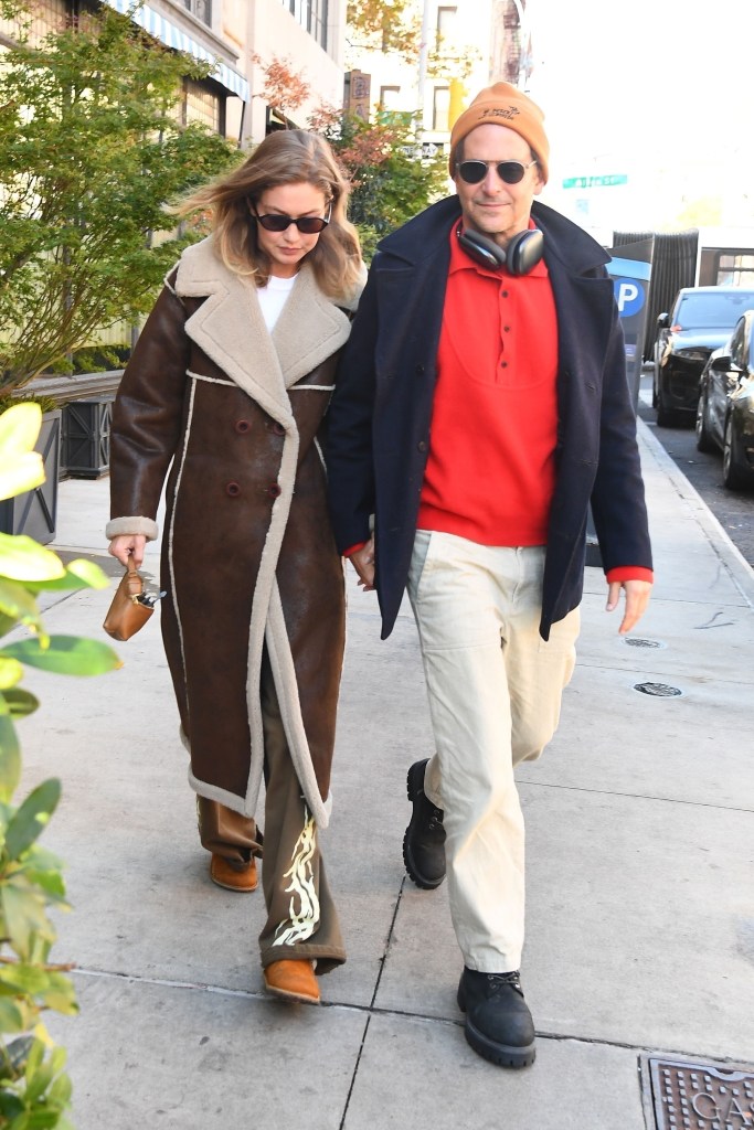 Bradley Cooper and Gigi Hadid leave the Nine Orchard Hotel hand in hand in NYC.