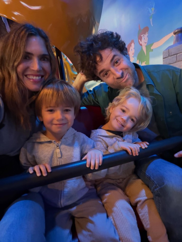 Mandy Moore and her family ride the Peter Pan ride at Disneyland.
