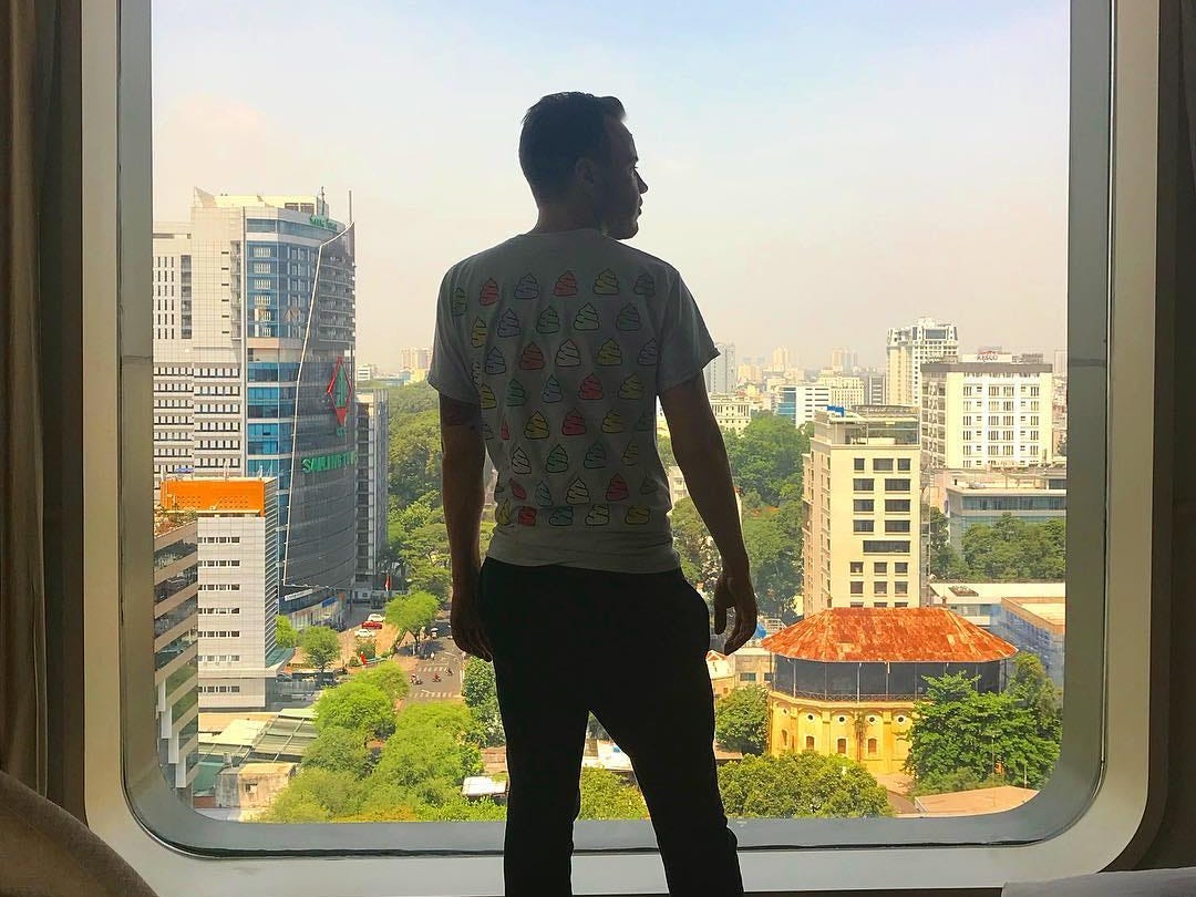 Looking out a window in Ho Chi Minh City, Vietnam.