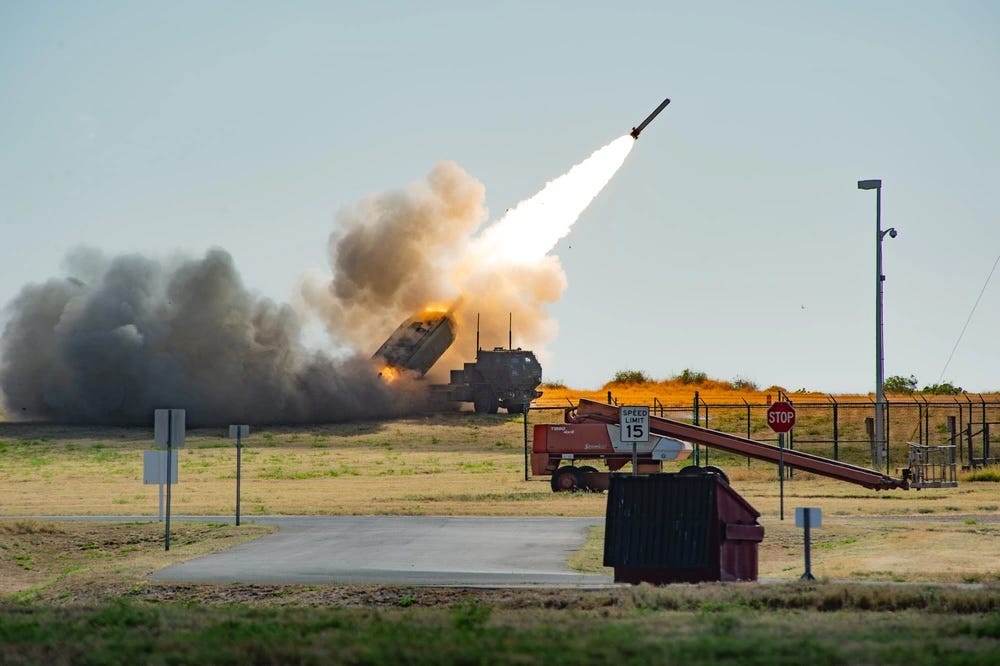A US Army task force fires a HIMARS launcher from a missile range facility during during a military exercise.