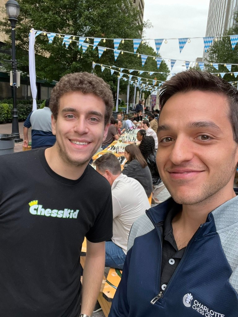 Charlotte Chess Club founder Peter Giannatos and Daniel Naroditsky together before the American chess grandmaster's death.