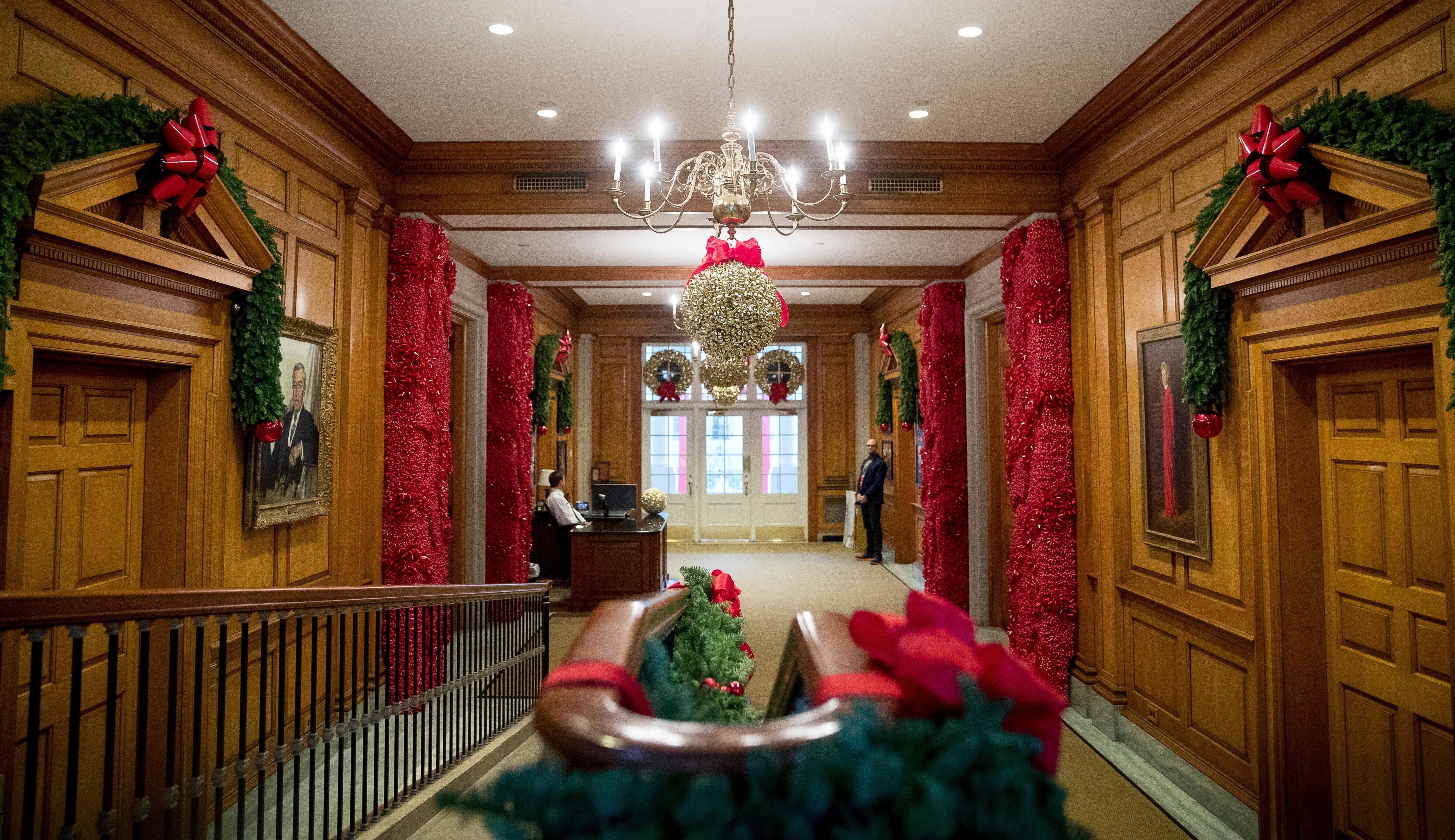 The East Wing hallway of the White House decorated for Christmas.