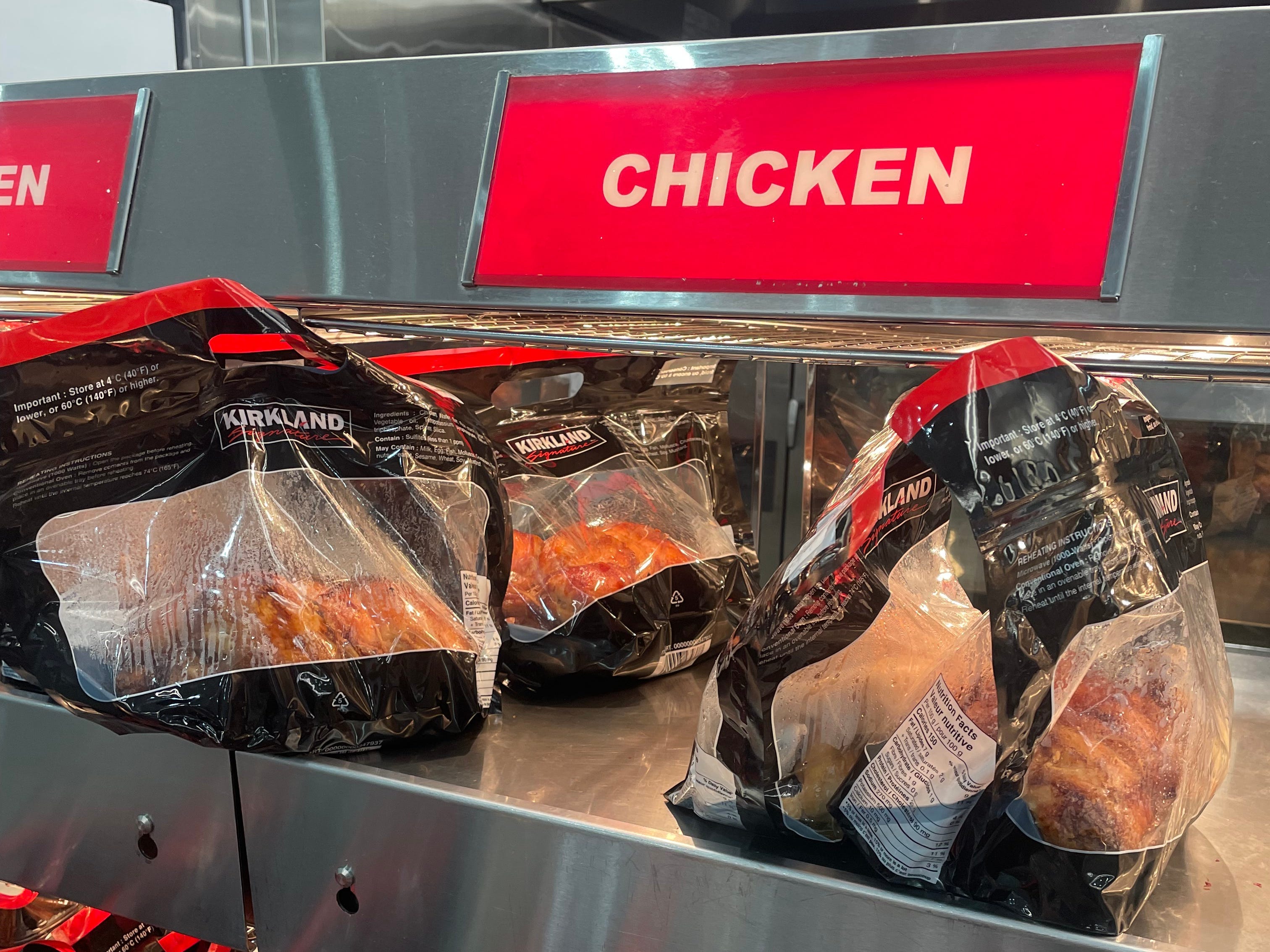 A display of rotisserie chickens at Costco.
