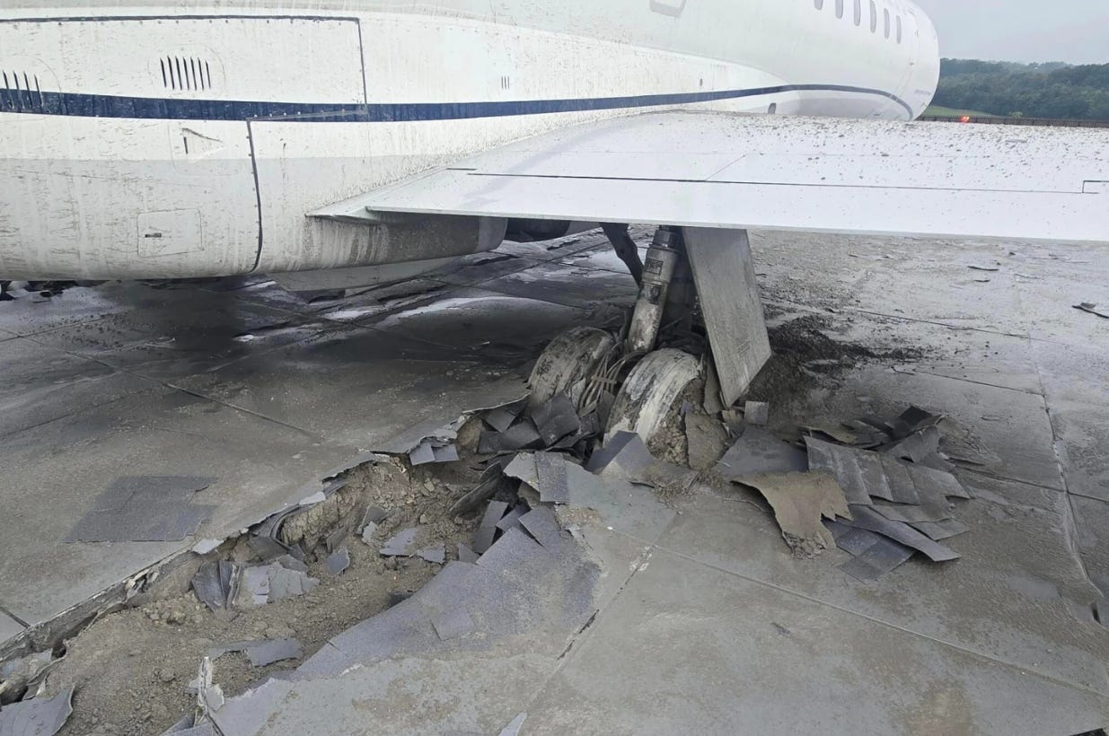 The CommuteAir plane's tires sunk in the EMAS.