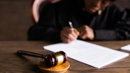 2 state employees convicted of receiving bribes