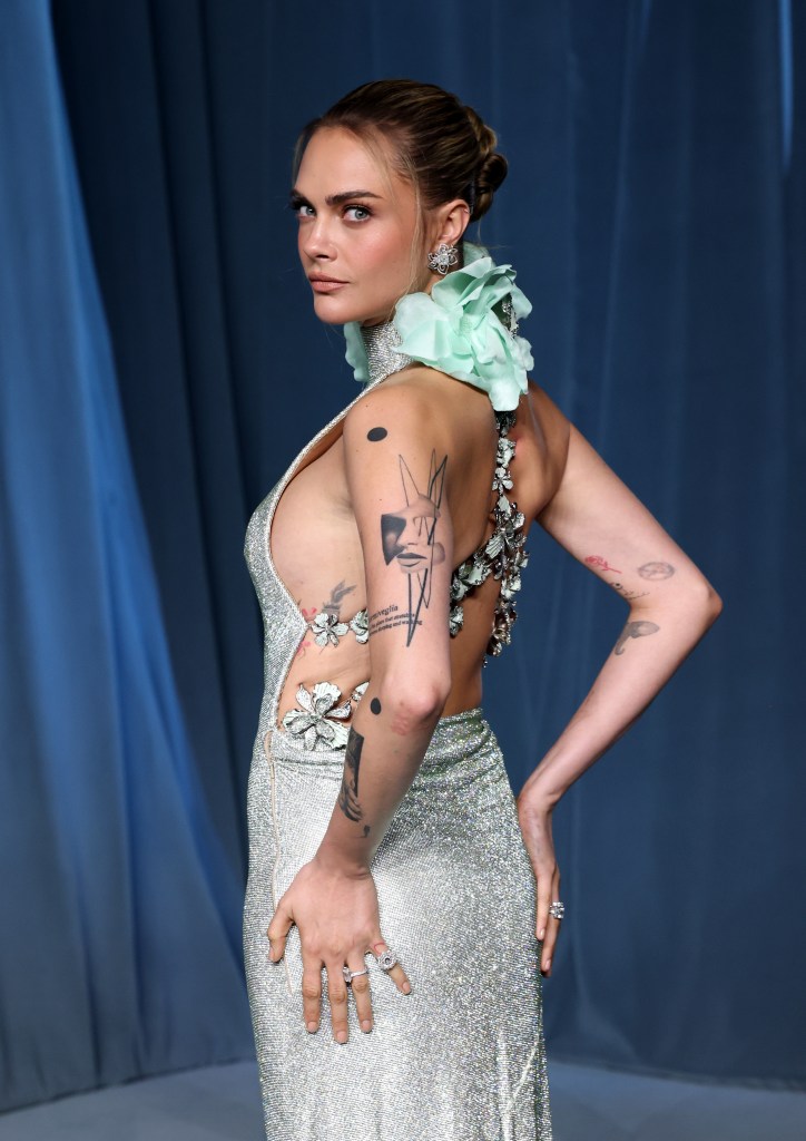 Cara Delevingne poses at the 5th Annual Academy Museum Gala.