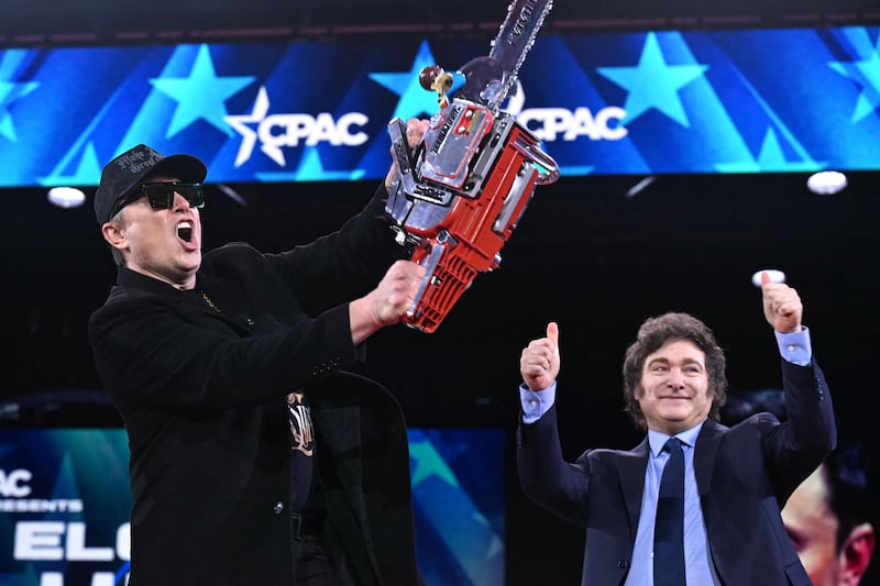 A new report shows that DOGE under Elon Musk, pictured with a chainsaw on February 20, actually wasted $21.7 billion despite its mission to cut government spending.