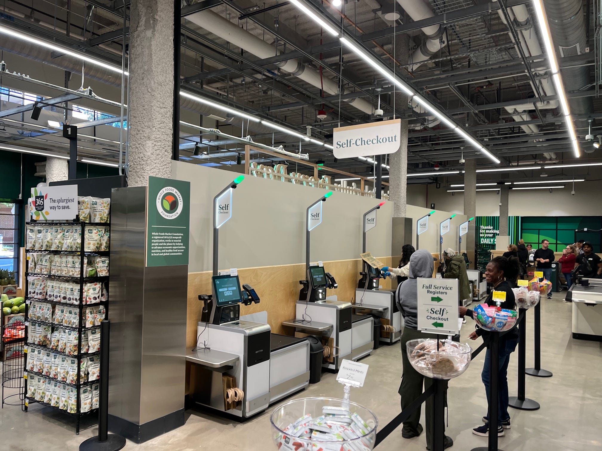 The checkout section at a Whole Foods Daily Shop store.