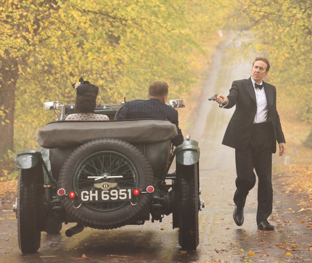 Nicolas Cage, playing a real-life WWII spy,  “shoots” a scene for movie “Fortitude”  in London.
