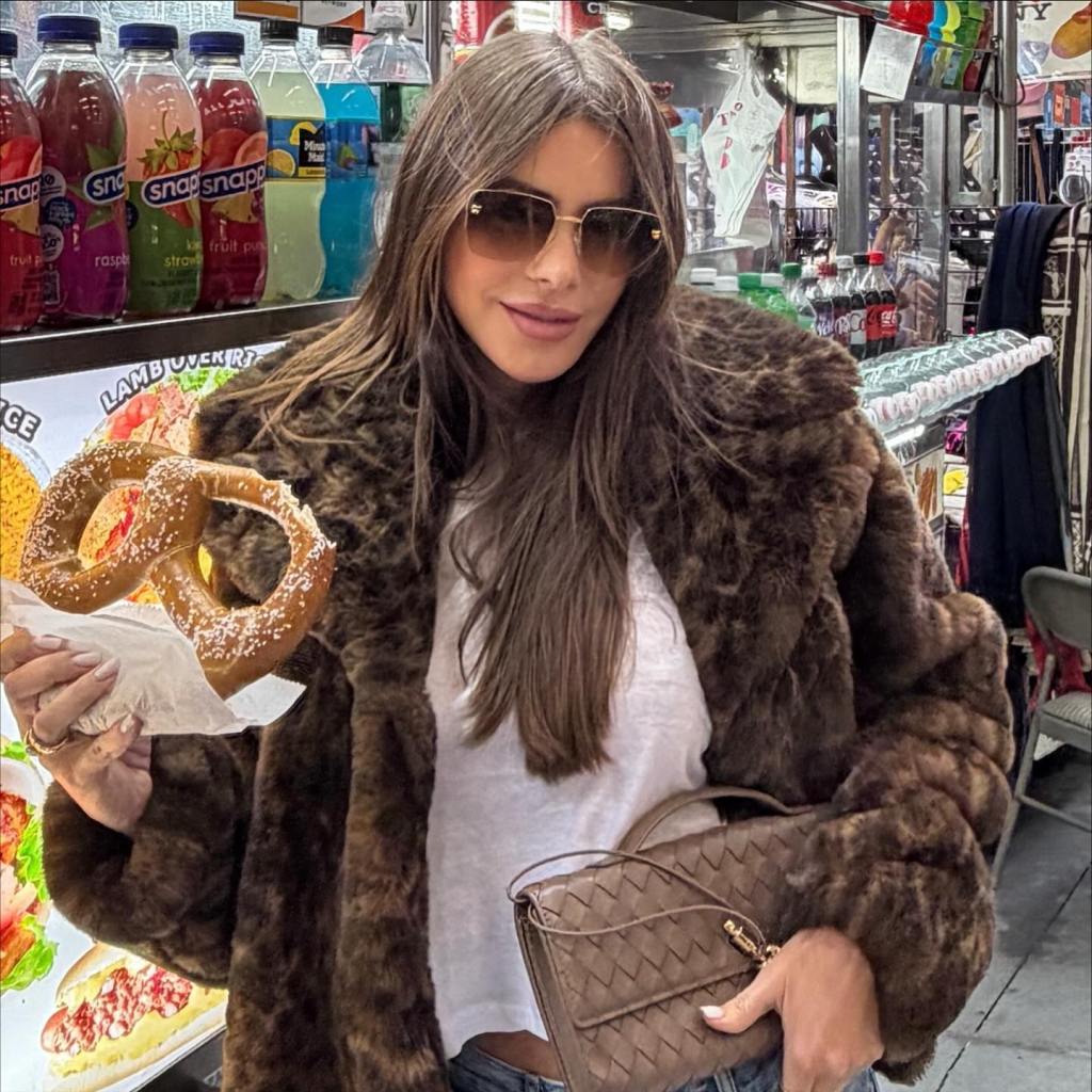 Sofía Vergara does the twist to promote  her jacket, part of her collab with Walmart.

