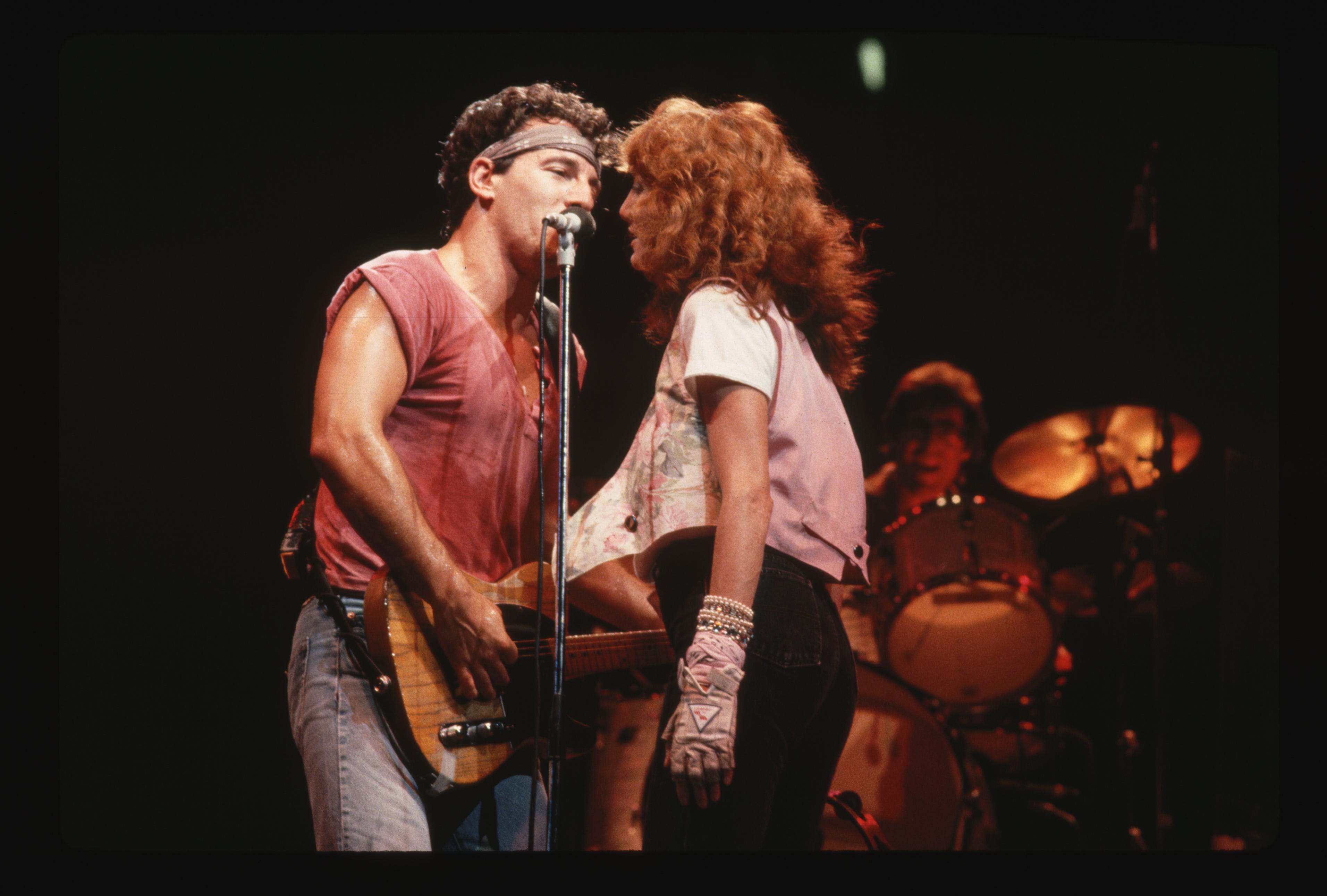 Bruce Springsteen and Patti Scialfa perform together in 1984.