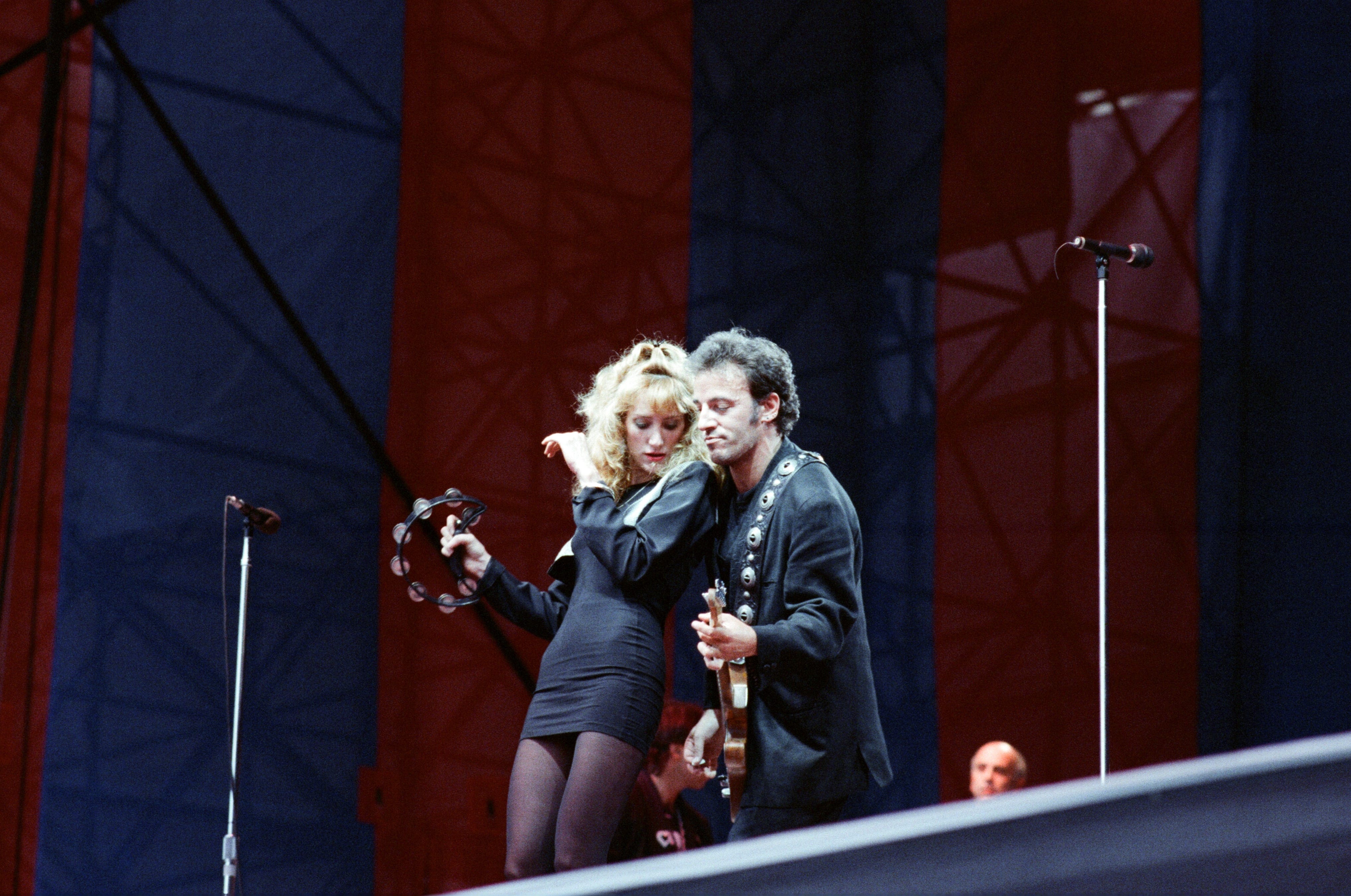 Patti Scialfa and Bruce Springsteen perform during the