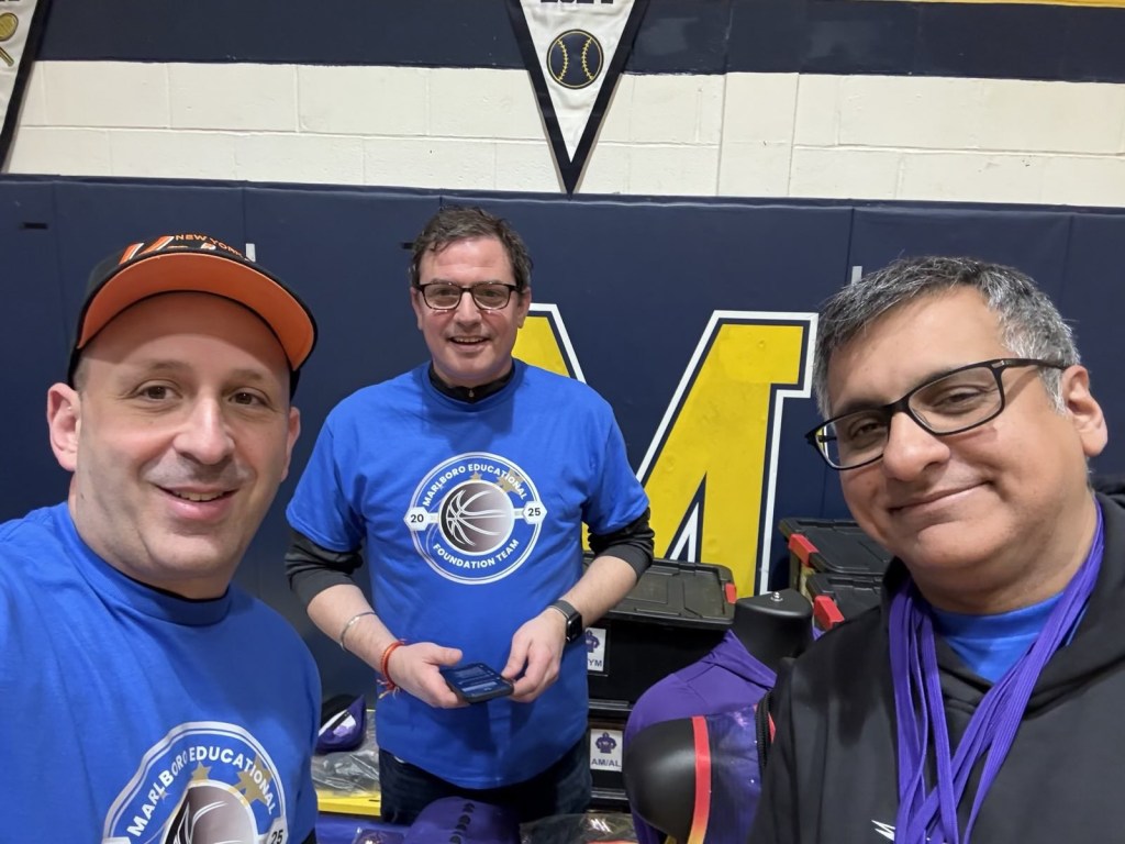 Lenny Thor, Chad Hyett, and Mitesh Gandhi smiling for a photo.
