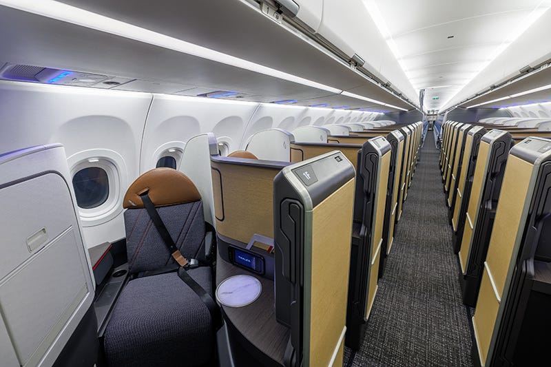 Looking down the aisle inside AA's A321XLR, business class is in front