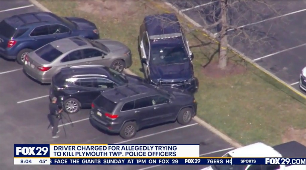 Aerial view of the scene where Dalton Lee Janiczek was arrested for allegedly striking two police officers with his vehicle.
