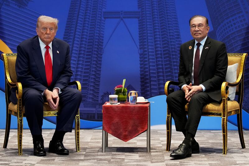 President Donald Trump and Malaysian Prime Minister Anwar Ibrahim attend a meeting in Kuala Lumpur.