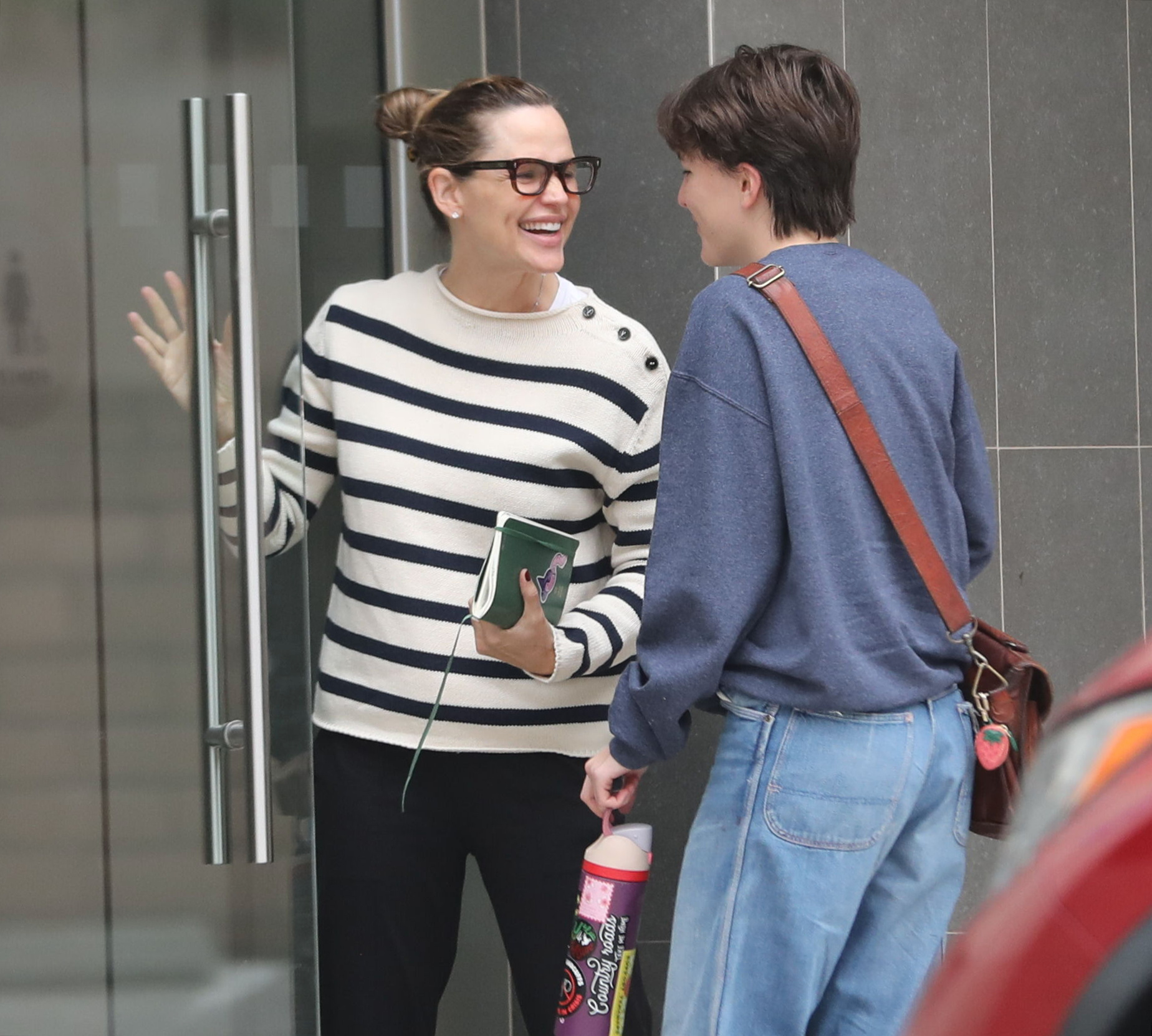 Jennifer Garner smiling at her transgender daughter Fin.