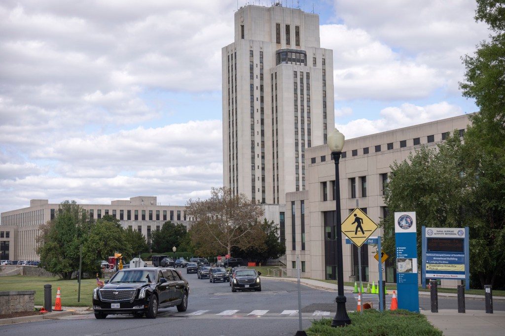 President Donald Trump in his limousine departing Walter Reed National Military Medical Center.