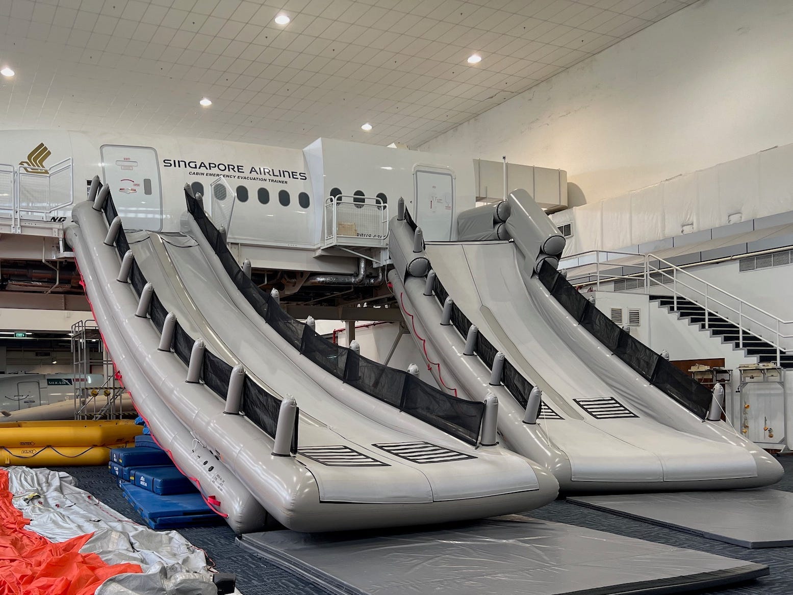 A view of the slides. The back one comes out of the A380 which has a wider cabin than the front of the plane.