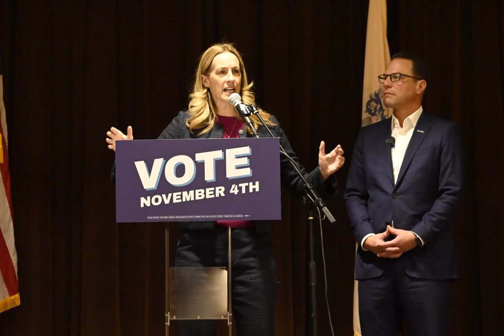 Mikie Sherrill speaking at an early vote rally next to Josh Shapiro.