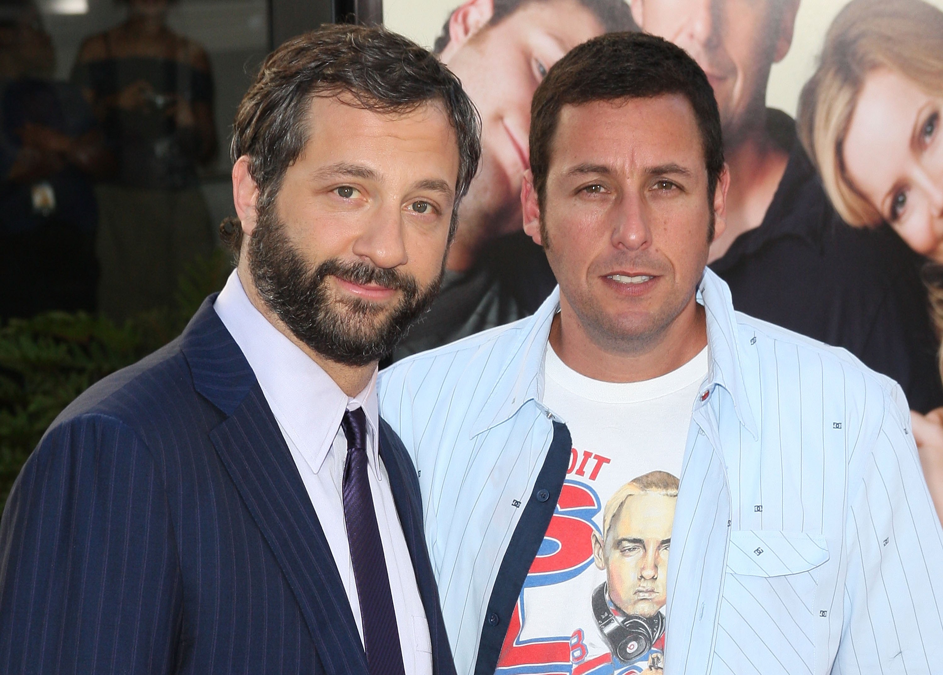 Judd Apatow and Adam Sandler.