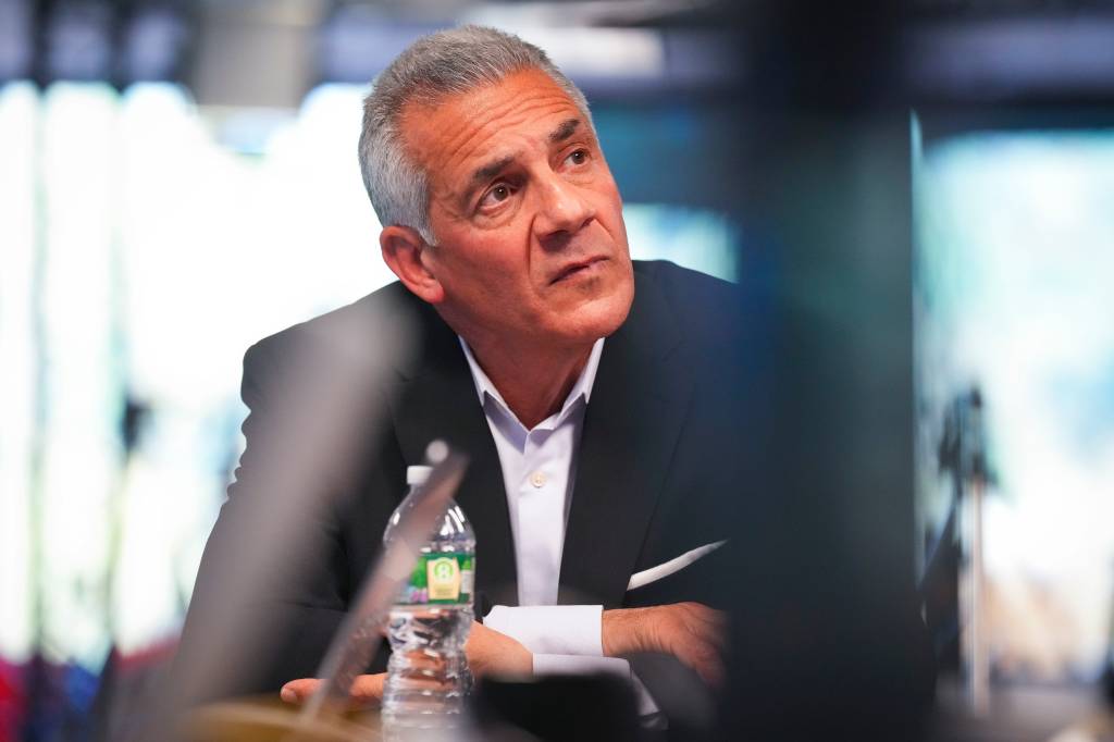 Jack Ciattarelli looks on while meeting with members of an editorial board.
