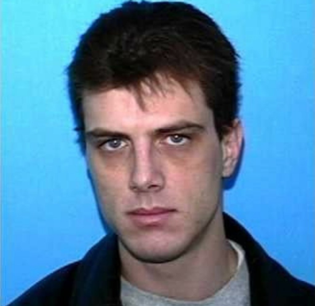 Photo of murder suspect Christopher Revak.