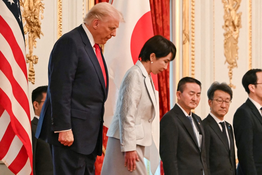 US President Donald Trump and Japan's Prime Minister Sanae Takaichi reviewing an honour guard of the Japan Self-Defense Force.