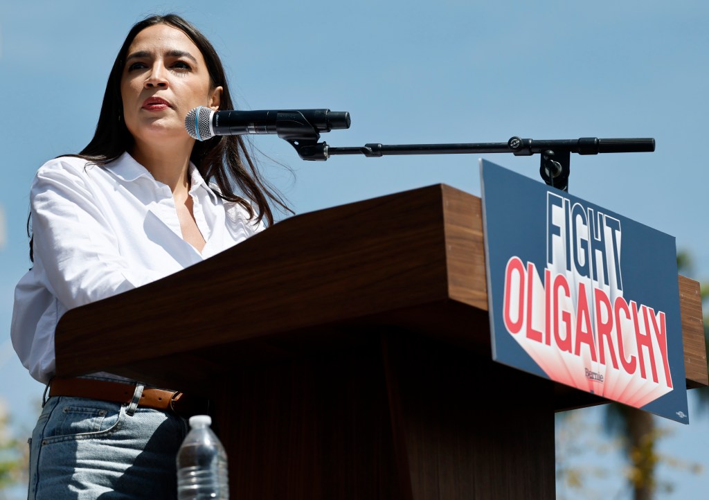 Rep. Alexandria Ocasio-Cortez (D-NY) speaks during a stop on the âFighting Oligarchyâ tour with U.S. Sen. Bernie Sanders (I-VT) at Grand Park on April 12, 2025 in Los Angeles, California.