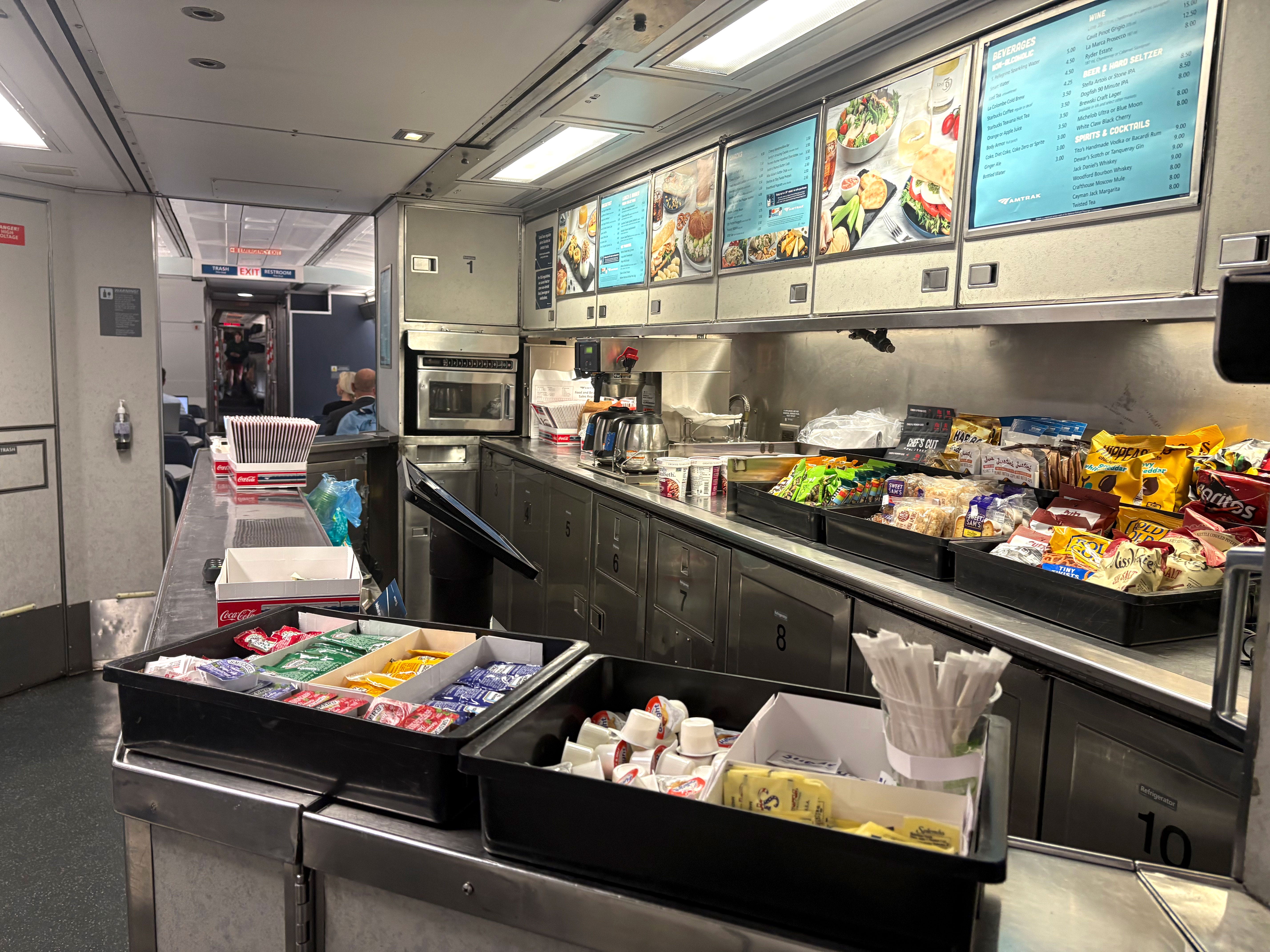 A cafe on an Amtrak train, selling variety of snacks, drinks, and hot food items.