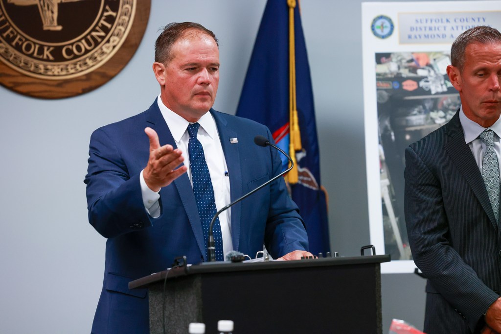 Suffolk County District Attorney Raymond A. Tierney speaking at a press conference