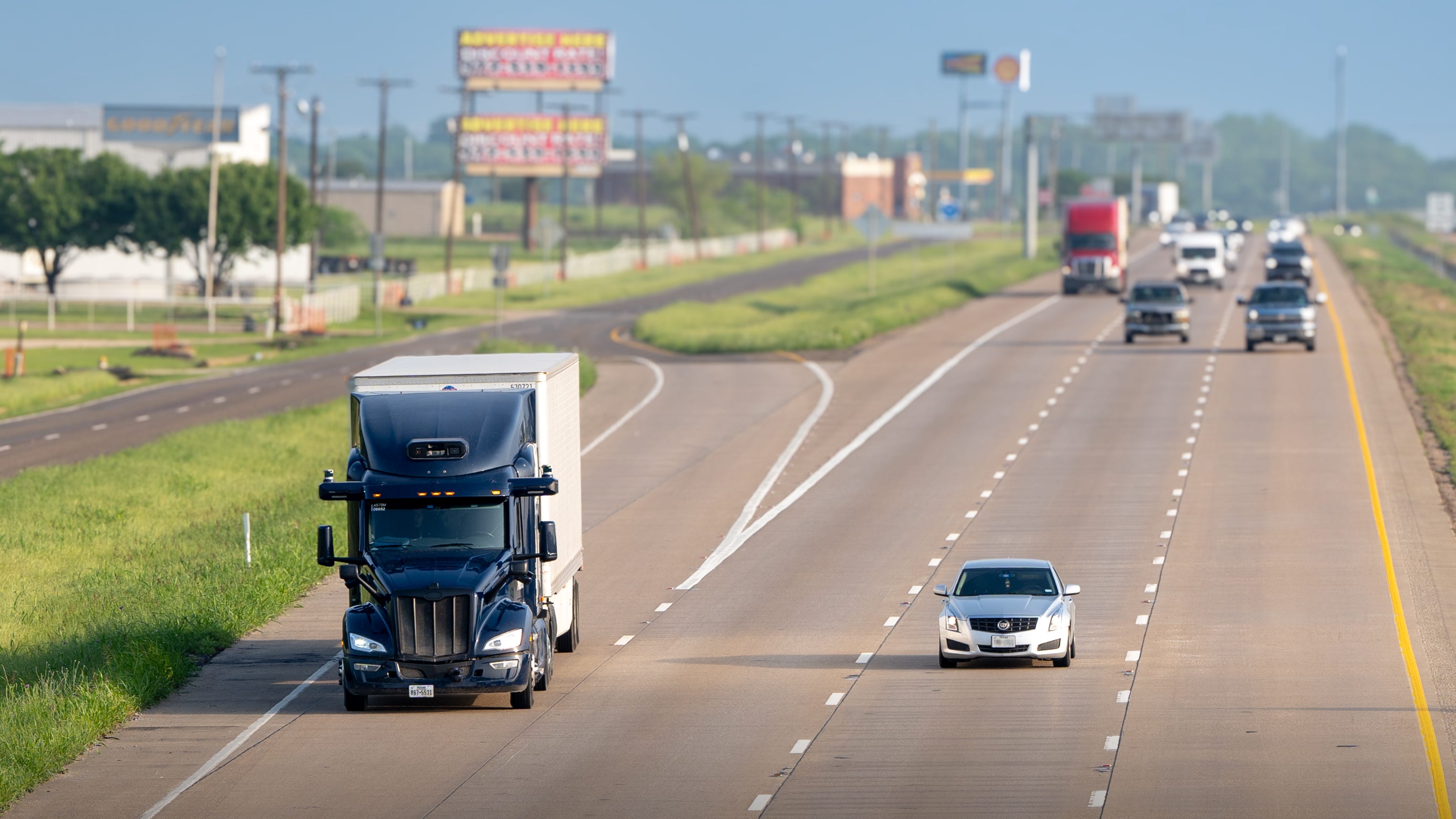 An Aurora Innovation truck hauling freight between Dallas and Houston.