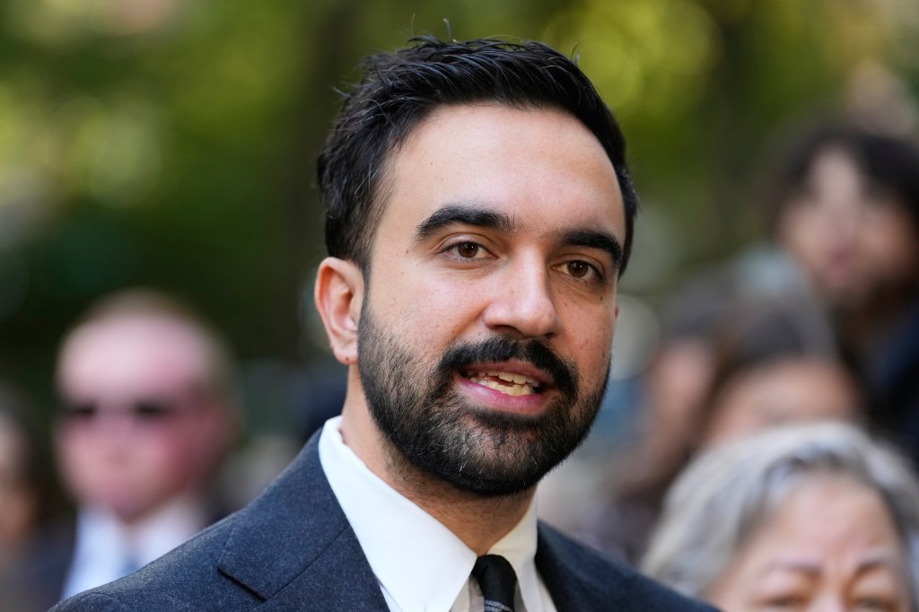 New York City mayoral candidate Zohran Mamdani talks to reporters.