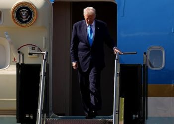 Trump, 79, Grips Railing for Dear Life While Descending Air Force One Stairs