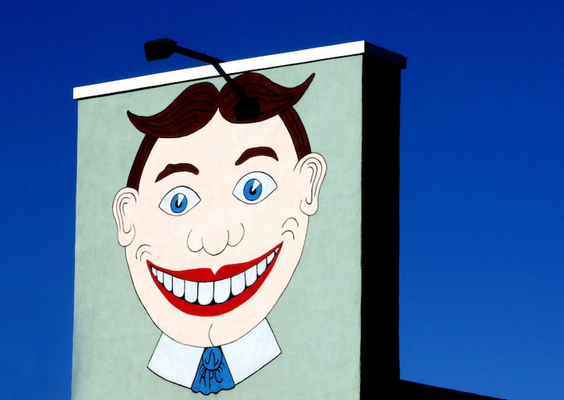 ASBURY PARK, NEW JERSEY - OCTOBER 3: The “TILLIE” mural is the legendary, iconic, smiling face which was painted on the side of the Palace Amusements during the winter of 1955-1956 in Asbury Park, New Jersey. This photograph, taken by Ross Lewis on October 30, 2018, is the restored "Tillie" mural. Originally, "Tillie" was a version of a funny face logo used by George C. Tilyou, who owned Steeplechase Park in Coney Island, New York in the early 20th Century.