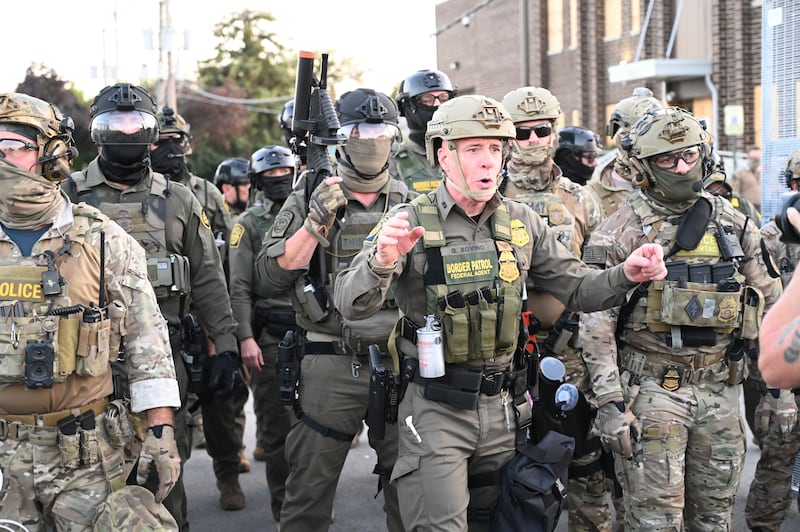 Border Patrol Chief Gregory Bovino of the El Centro Sector stands amid a protest outside an ICE facility in Broadview