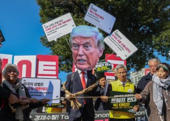 Massive Trump Face Pops Up at Protest Slamming His South Korea Visit