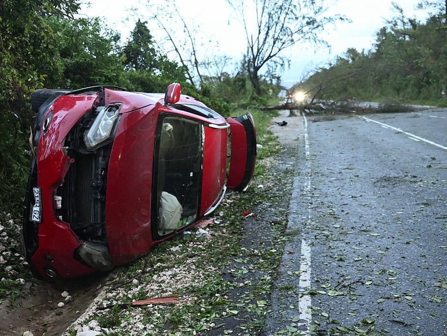 A damaged car in Manchester, Jamaica.