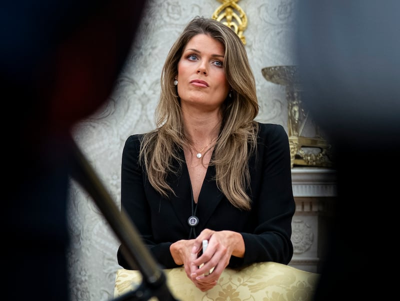 WASHINGTON, DC - MARCH 31: Lindsey Halligan, attorney for U.S. President Donald Trump, looks on during an executive order signing in the Oval Office of the White House, on March 31, 2025 in Washington, DC. (Photo by Al Drago/Getty Images)