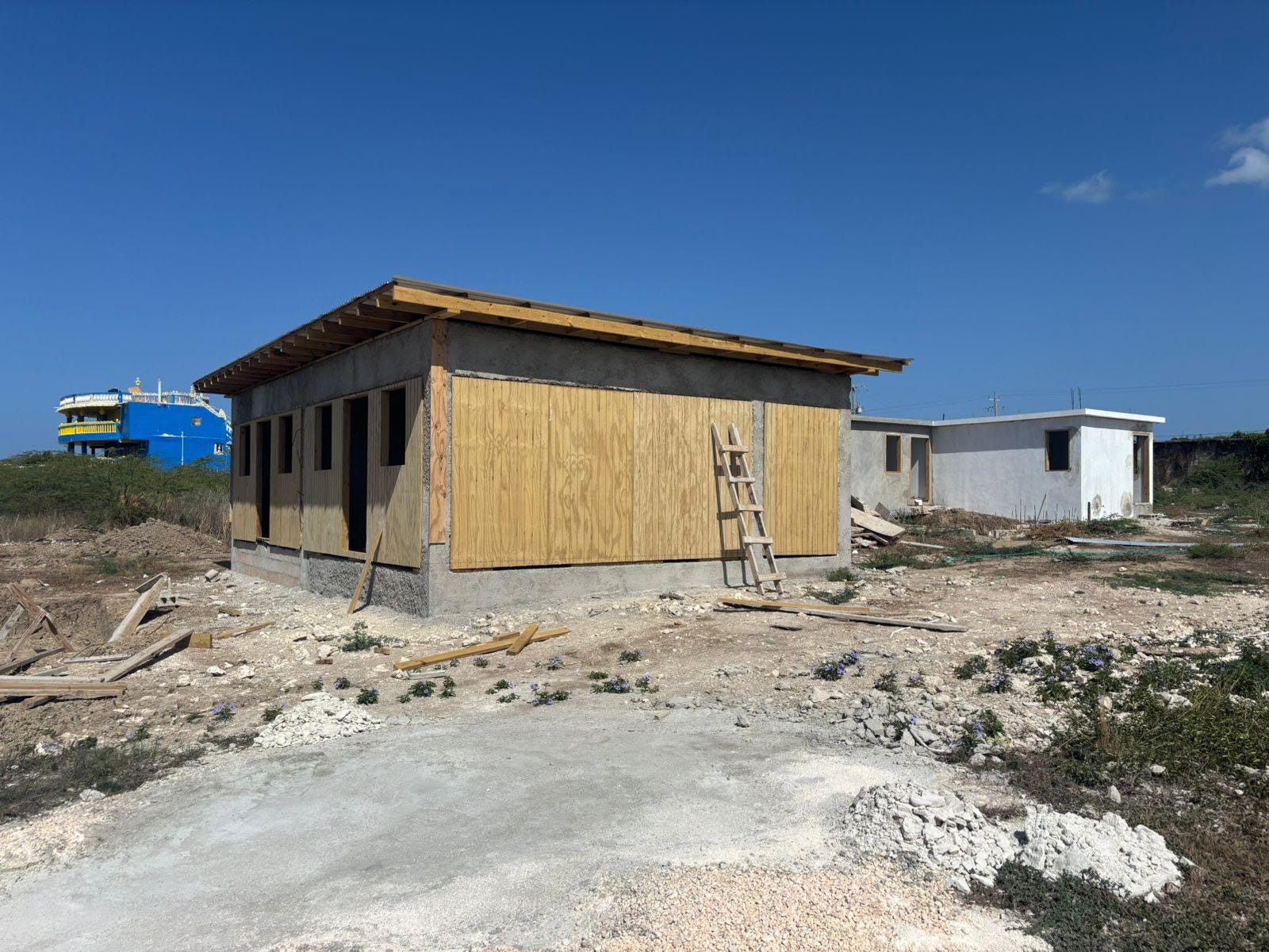 Senior's new villa before the hurricane.
