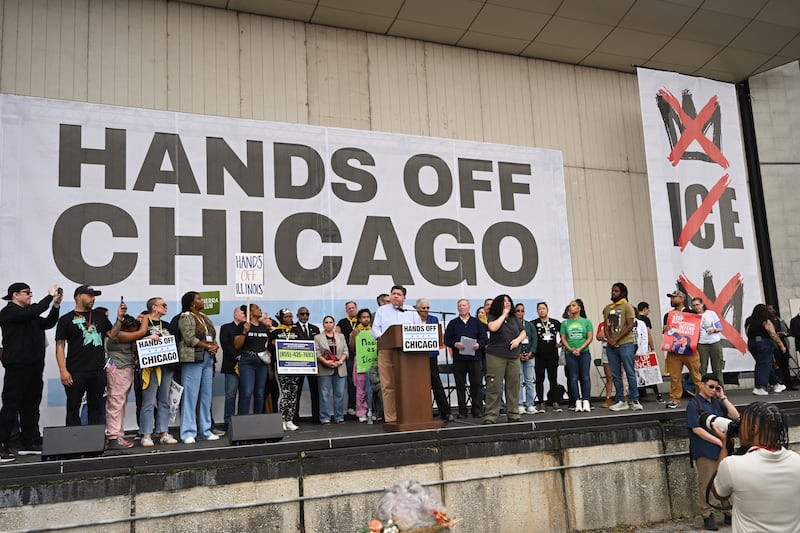 B Pritzker, Governor of Illinois, speaks onstage as people protest as part of the No Kings Rallies