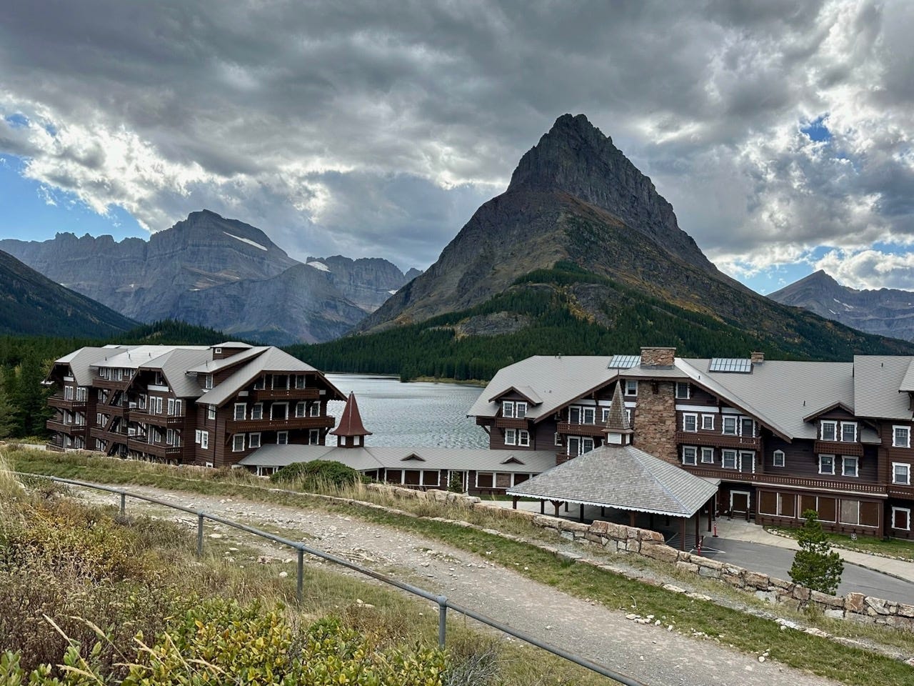 View of buildings in front of glaciers, mountains