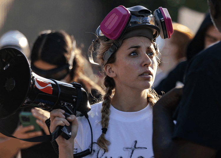 ‘Gen Z’ Dem candidate charged with interfering with ICE posted video of herself in mob blocking unmarked SUV